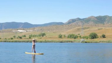 öğrenme kadın nasıl yapılır paddleboard 