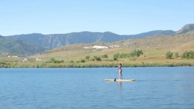 öğrenme kadın nasıl yapılır paddleboard 