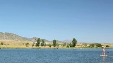 öğrenme kadın nasıl yapılır paddleboard 