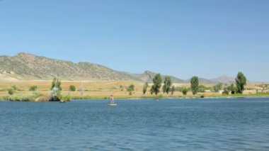 öğrenme kadın nasıl yapılır paddleboard 