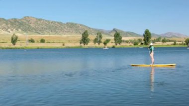öğrenme kadın nasıl yapılır paddleboard 
