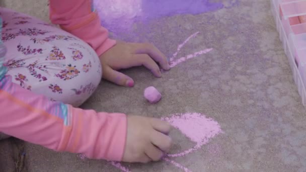 Little Girl Playing Chalk Driveway Front House — Stock Video