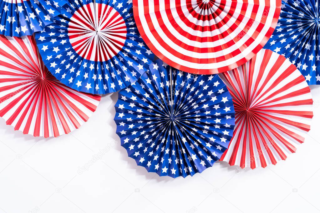 Red, white, and blue paper fans for July 4th celebration.