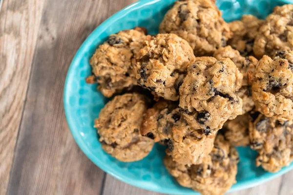 Freshly Baked Chewy Oatmeal Raisin Cookies Blue Plate — Stock Photo, Image