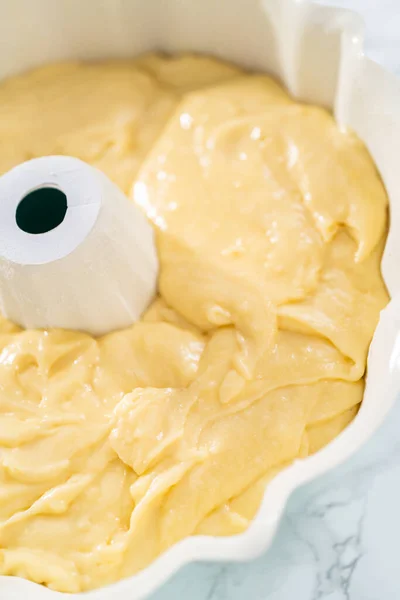 Cake batter in bundt cake pan ready for baking.