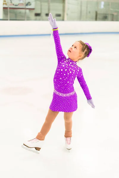 Little Girl Practicing Figure Skating Purple Dress Crystals Indoor Ice — Stock Photo, Image