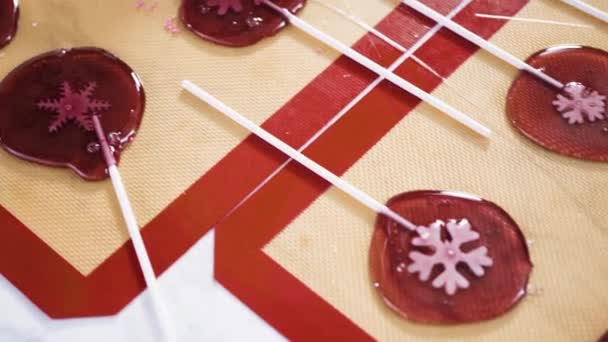 Making Homemade Berry Flavor Lollipops Snowflakes — Stock Video