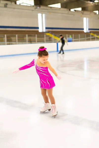 Little Figure Skater Pink Dress Practicing Indoor Ice Rink — Stock Photo, Image