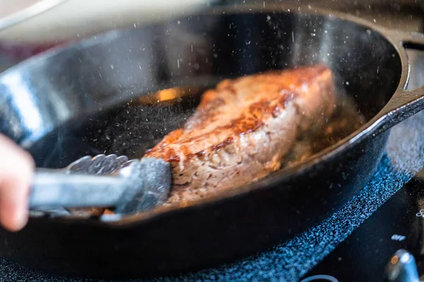 Frying New York Strip Steak Cast Iron Frying Pan Electric — Stock Photo, Image