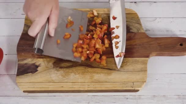 Mincing Organic Red Bell Peppers Wood Cutting Board — Stock Video