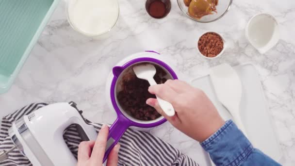 Making Chocolate Bundt Cake Chocolate Frosting — Stock Video