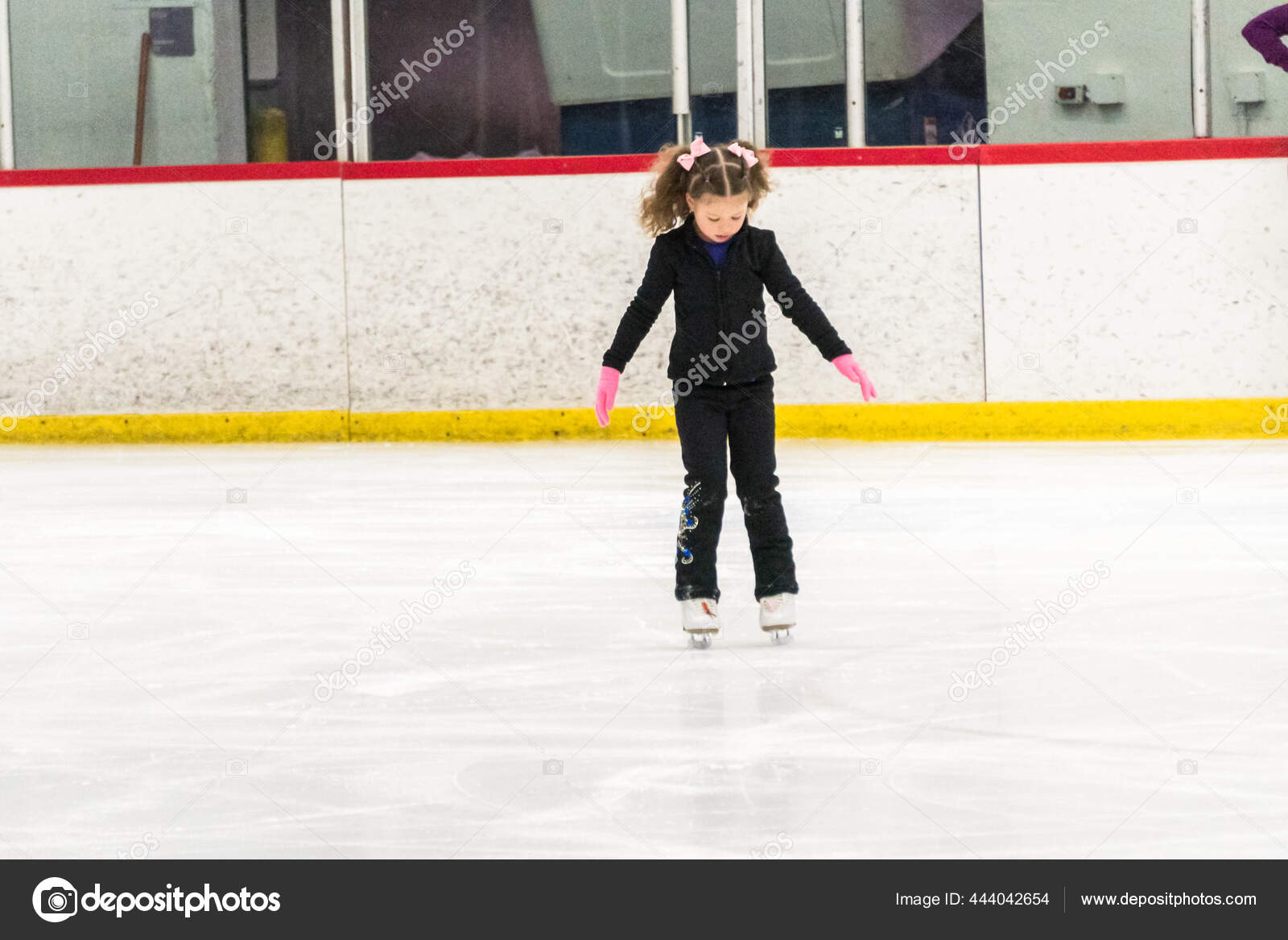 Little Girl Practicing Figure Skating Moves Indoor Ice Rink Stock Photo