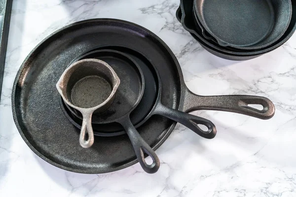 Variety Cast Iron Frying Pans Marble Background — Stock Photo, Image