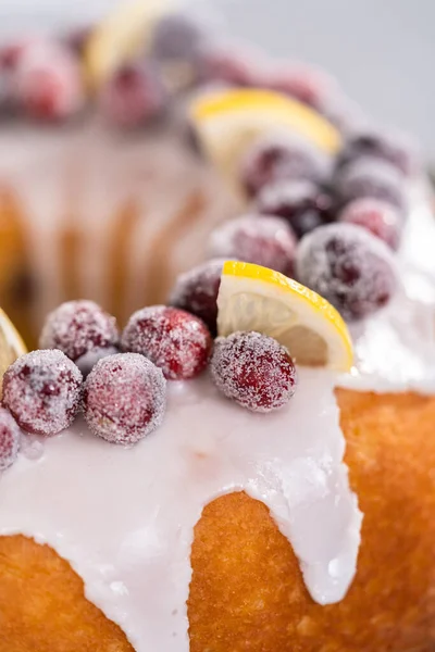 Lemon Cranberry Bundt Cake Decorated Sugar Cranberries Lemon Wedges Cake — Stock Photo, Image