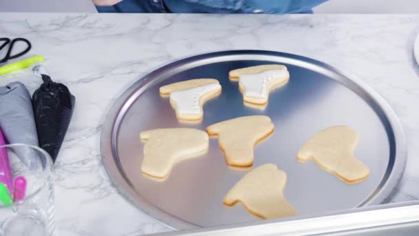 Brushing Edible Glitter Iced Figure Skate Sugar Cookies — Stock Video