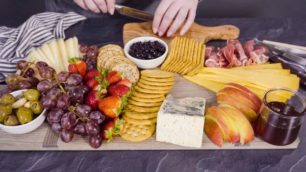 Arranging Gourmet Cheese Crakers Fruits Board Large Cheese Board — Stock Photo, Image