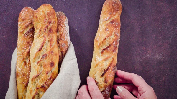 Flat lay. Freshly baked homemade French baguette bread.