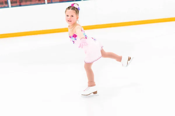 Little Girl Pretty Pink Dress Flowers Practicing Figure Skating Moves — Stock Photo, Image