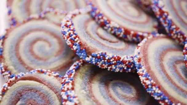 Rolling Edges Red White Blue Pinwheel Sugar Cookies Sprinkles — Stock Video