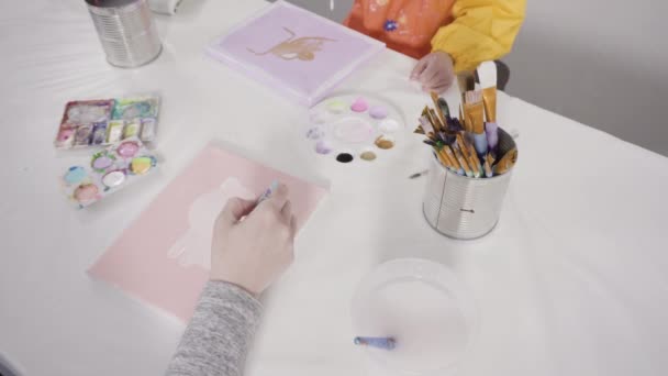 Little Girl Painting Paper Mache Figurines Acrylic Paint Her Homeschooling — Stock Video