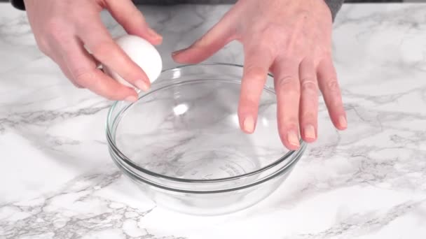 Mixing Ingredients Breaking Eggs Glass Mixing Bowl — стоковое видео
