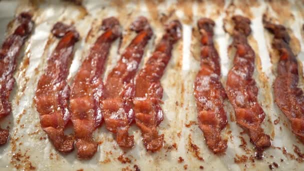 Cooked Bacon Strips Baking Sheet White Parchment Paper — Stock Video