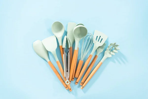 Flat Lay New Blue Silicone Kitchen Utensils Wooden Handles Blue — Stock Photo, Image