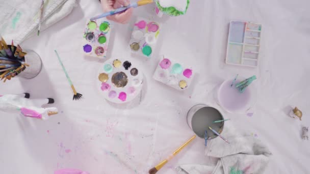 Homeschooling Covid Lockdown Little Girl Painting Paper Mache Easter Bunny — Stock Video