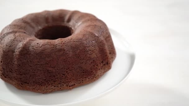 Sliced Chocolate Bundt Cake Chocolate Frosting Decorated Fresh Cranberries Rosemary — Stock Video