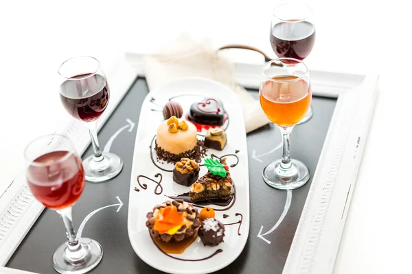 Tasting of wine and pattie chocolate pastries — Stock Photo, Image