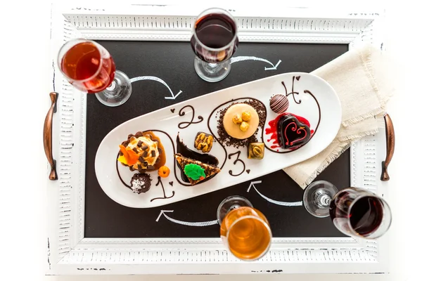 Tasting of wine and pattie chocolate pastries — Stock Photo, Image