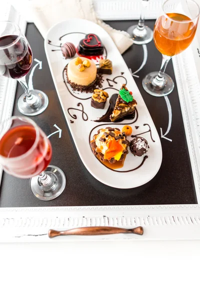 Tasting of wine and pattie chocolate pastries — Stock Photo, Image