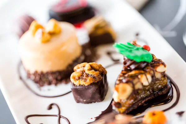 Tasting of wine and pattie chocolate pastries — Stock Photo, Image