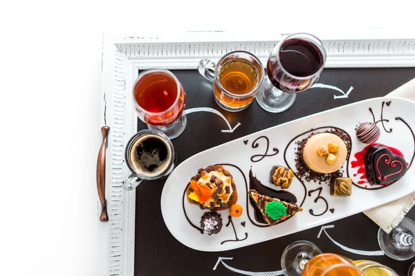 Tasting of wine and pattie chocolate pastries — Stock Photo, Image