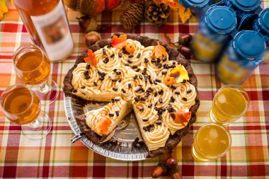 Pumpkin Pie and beer for Thanksgiving. clipart