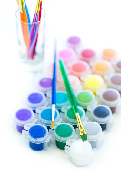 Paints and brushes School supplies — Stock Photo, Image