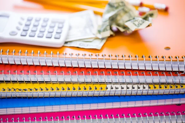 Cash, calculator and note books — Stock Photo, Image