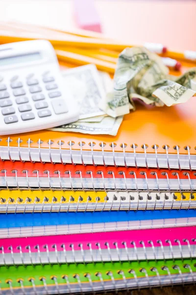 Cash, calculator and note books — Stock Photo, Image