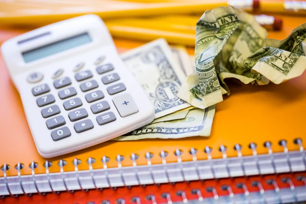 Cash, calculator and note books — Stock Photo, Image