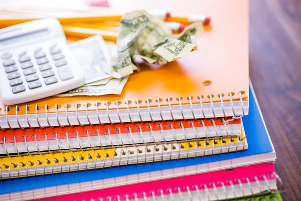 Cash, calculator and note books — Stock Photo, Image