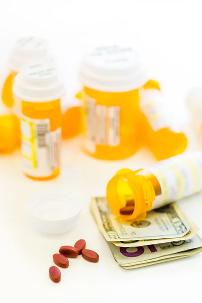 Prescription pills and dollar bills — Stock Photo, Image