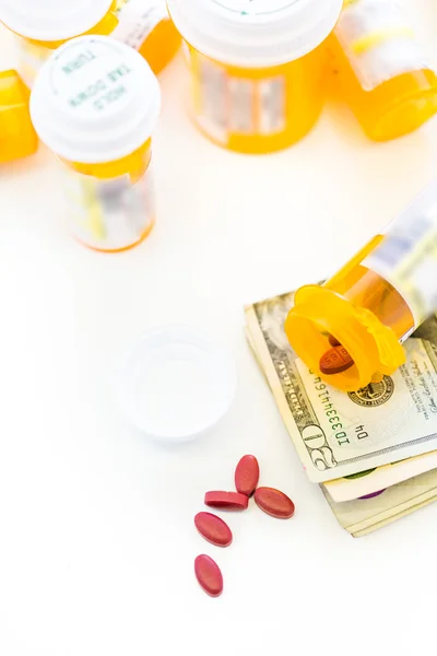 Prescription pills and dollar bills — Stock Photo, Image