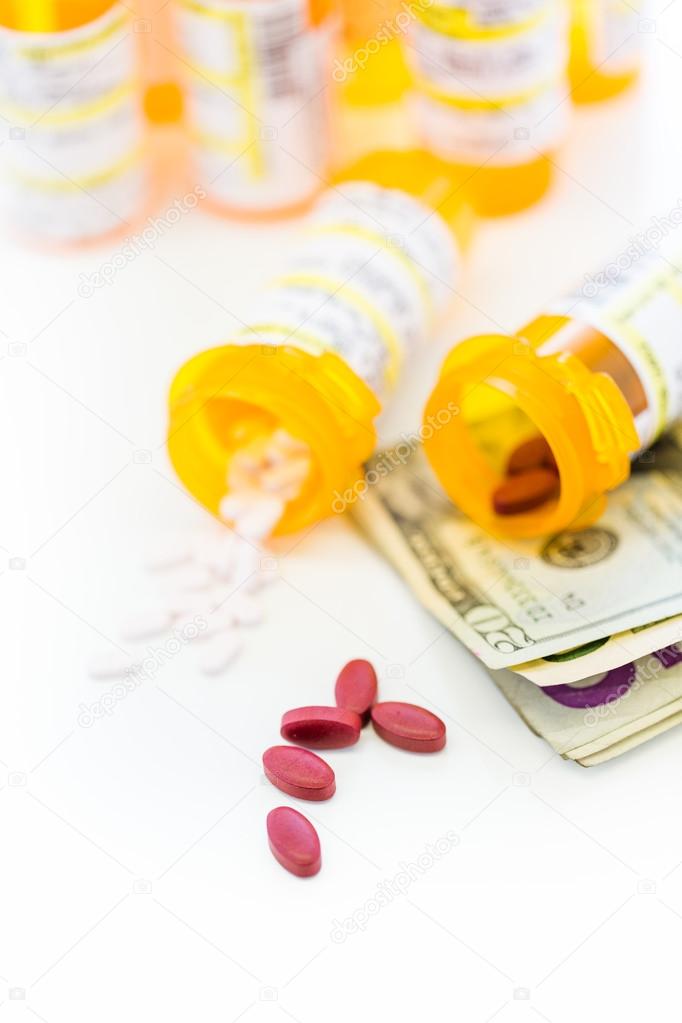 Prescription pills and dollar bills