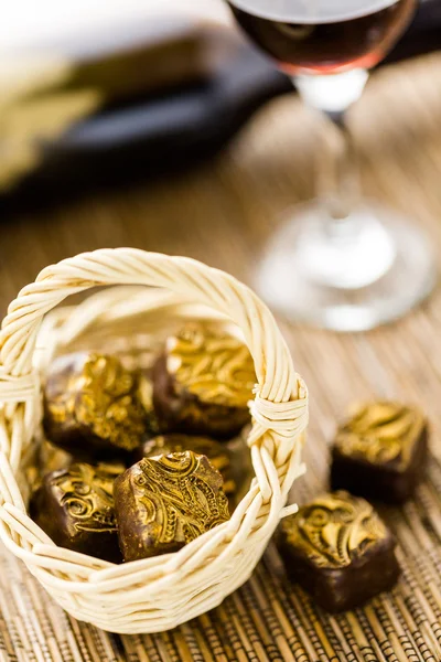 Chocolate truffles and wine — Stock Photo, Image