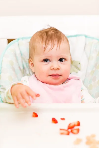 Baby girl eating meal — Stock Photo, Image