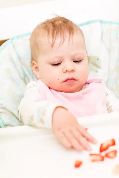 Baby girl eating meal — Stock Photo, Image