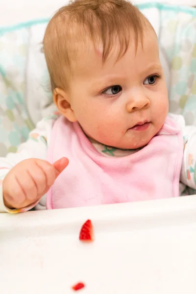 Baby girl eating meal — Stock Photo, Image