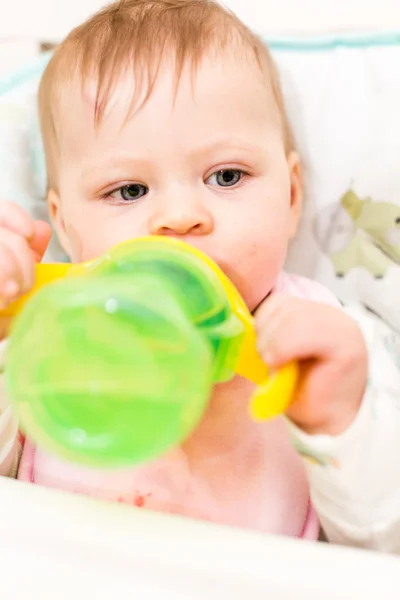 Baby girl eating — Stock Photo, Image