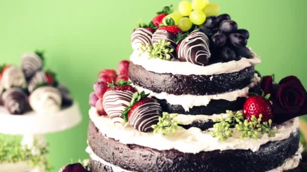 Tasty tiered cake with fruits — Stock Video