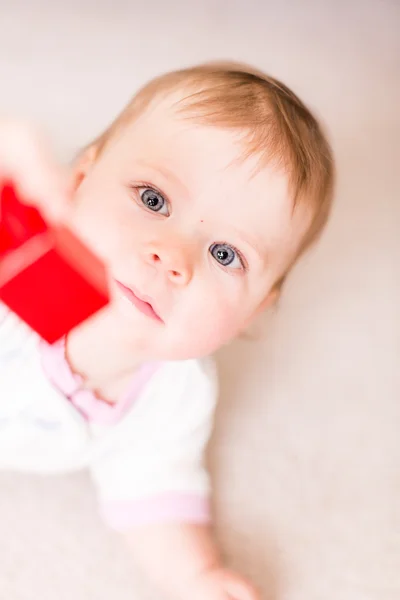 Cute baby girl with cubes — Stock Photo, Image